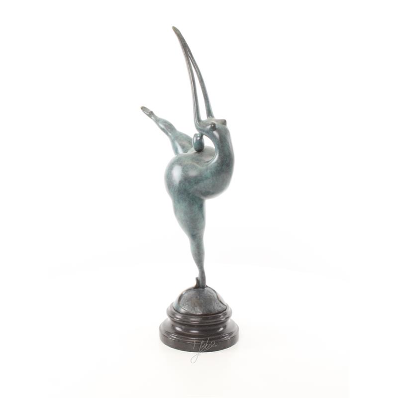 Een bronzen beeld/sculptuur van een naakte danseres