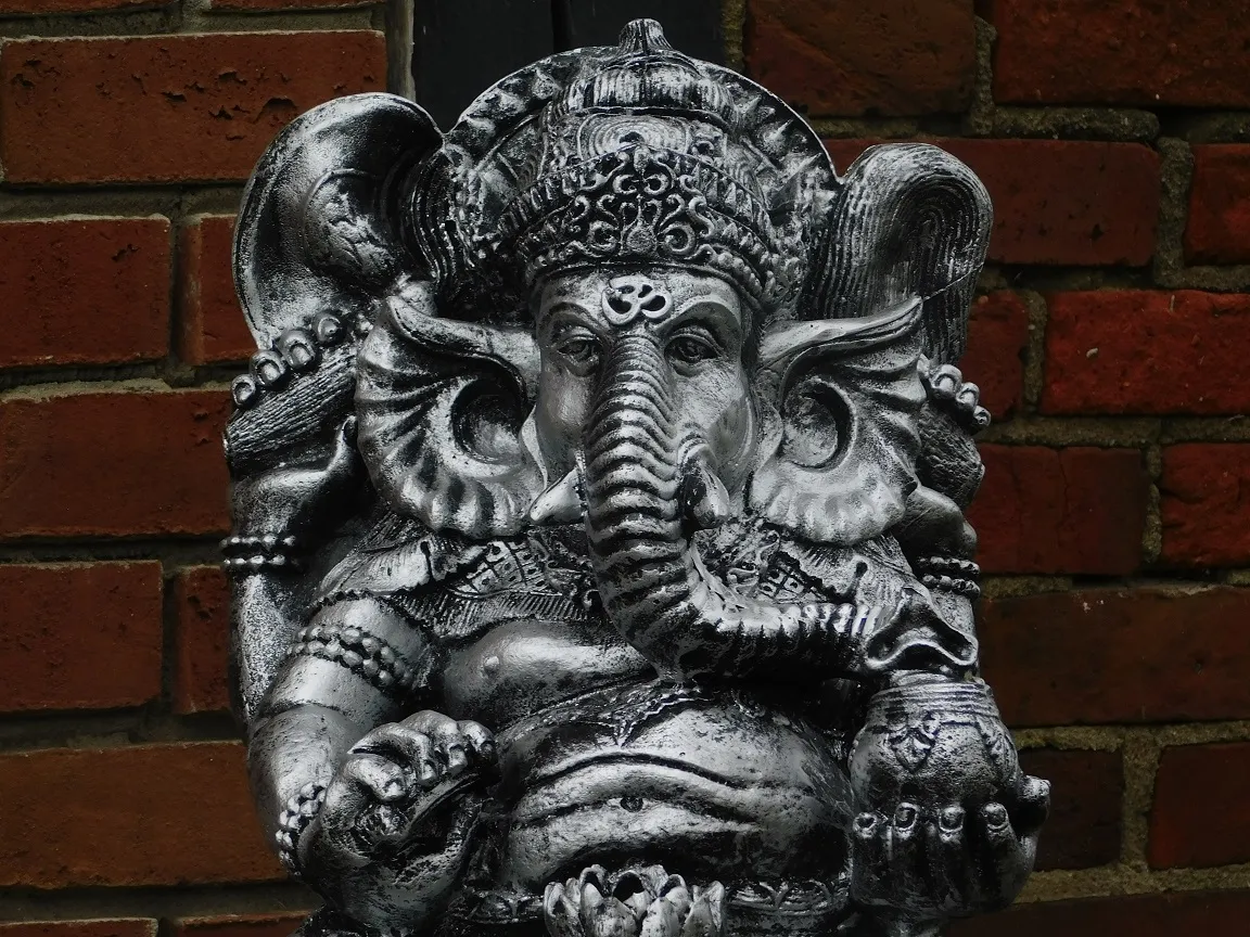 Rationalisatie Uit routine Tuinbeeld Ganesha, tuindecoratie Hindoeïsme, beeld