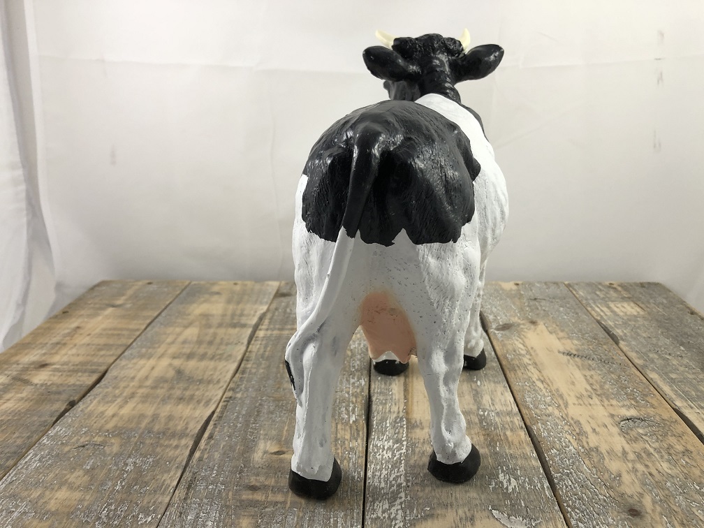 Schöne Polystone-Skulptur einer Milchkuh schwarz-bond