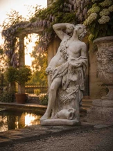 Tuinbeeld Bacchus - groot Romeins figuur - klassiek steen