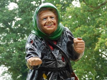Humoristisch karakterbeeld van een bedelvrouw van polystone