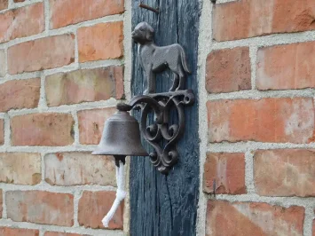 Sonnette avec chien - fonte - marron