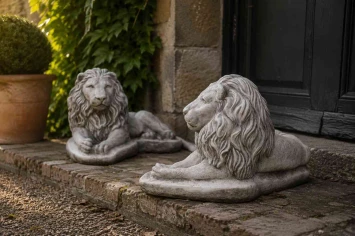 Liggende leeuwen - stenen dierenbeeld - 65 cm - set van 2