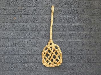 Batteur de tapis à l'ancienne