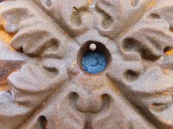 Wandanker in Rosettenform - mit Blättern - rustikal braun