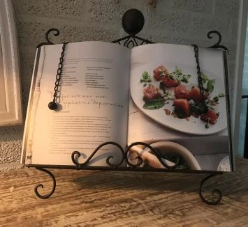 Een standaard houder voor muziekstukken, menu's, boeken etcetera