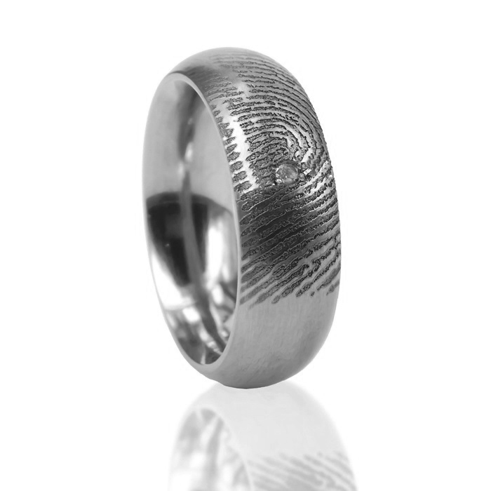 Bolle zilveren ring met vingerafdruk en steen