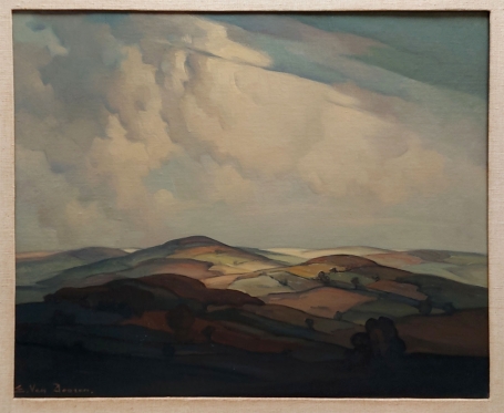 Belgische kunstenaar Edmond Van Dooren met een landschapsschilderij