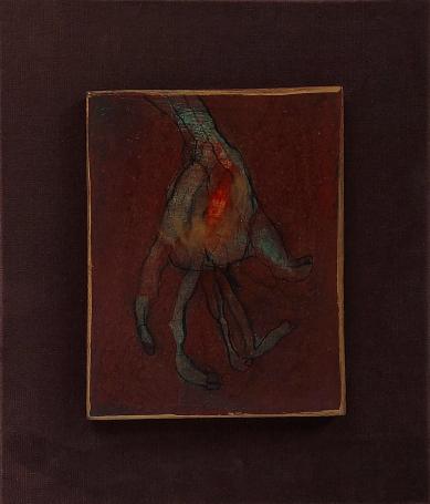 Hugo Heyens met een kunstwerkje in kader