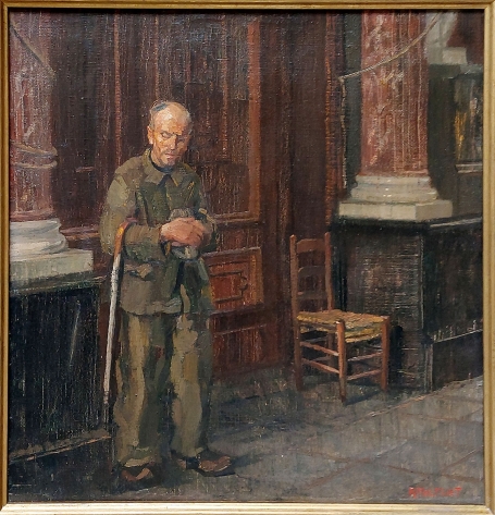 Belgische etser R. Malfliet met een schilderij