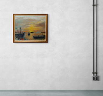 Boten op de Schelde bij ondergaande zon