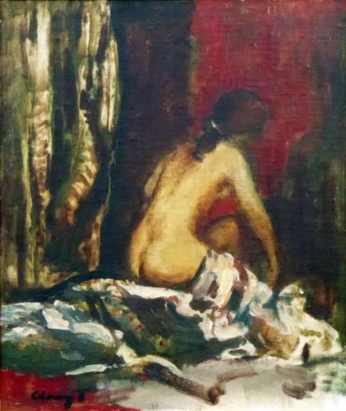 Rug van naakte vrouw op bed gezeten