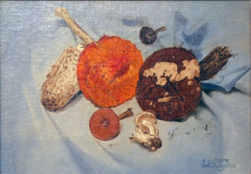 De Belgische schilder Antoon Luyckx  met een schilderij met paddestoelen