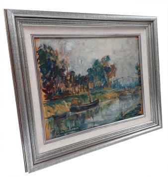 Bootje aan de ophaalbrug van de rivier