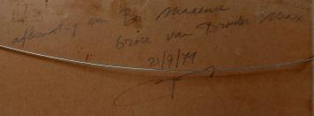 De man met snor en pet