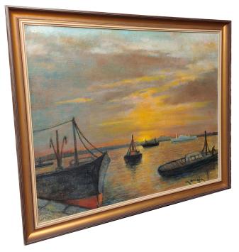 Boten op de Schelde bij ondergaande zon