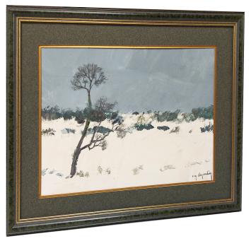 Eénzame boom in de sneeuw