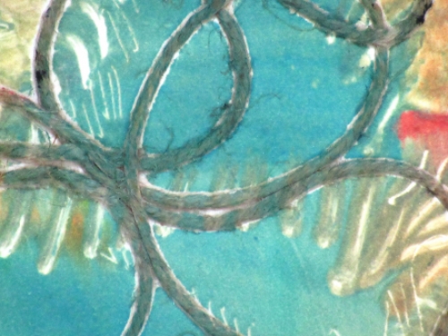 Gustaaf Prils  met een kreurrijk werk met touw