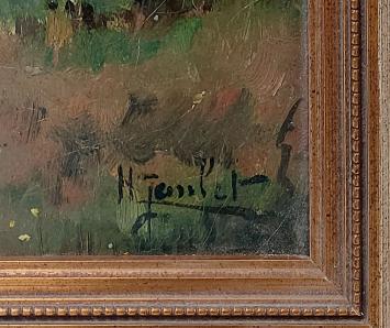 Henri Janlet met een kunstwerkje op bord