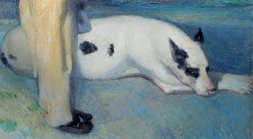 Jongentje met grote witte hond