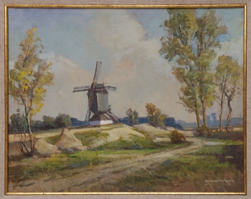 De Belgische kunstenaar Herman Verbaere met een olieverfschilderij
