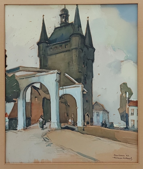 De Belgische kunstenaar Herman Verbaere met een schilderij