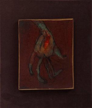 Hugo Heyens met een kunstwerkje in kader