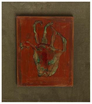 Hugo Heyens met een kunstwerkje in kader