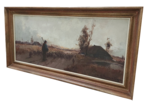 Herder met schapen op de heide