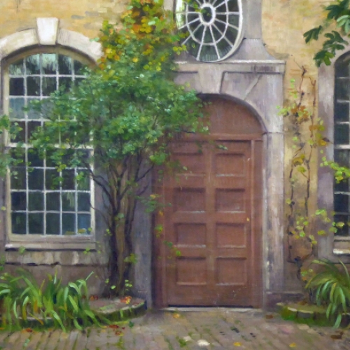 René Janssens met een olieverschilderij