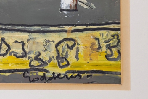 Boot en vissersnetten achter de keermuur