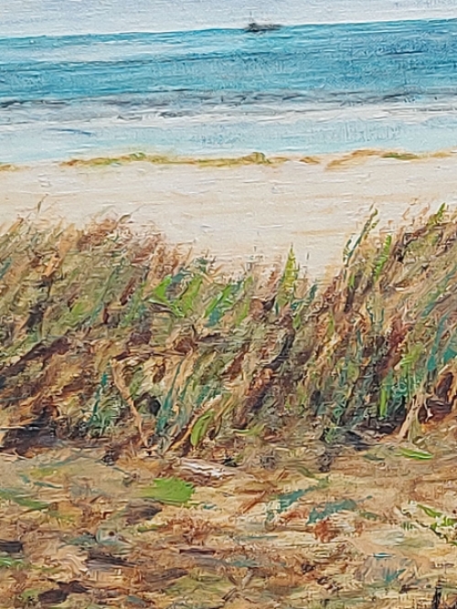 Lucien Calus  met een zeegezicht op doek