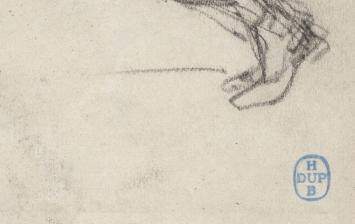 Lucien van der Borcht met schets op papier