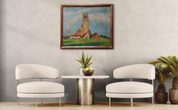 Zicht langs de velden op de Damse toren