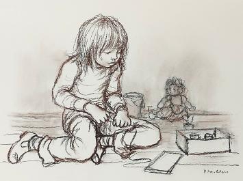 Kindje spelend met speelgoed