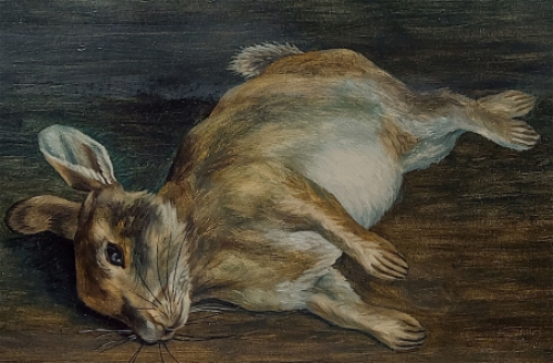 Paul Van Dessel met een schilderij van een konijn