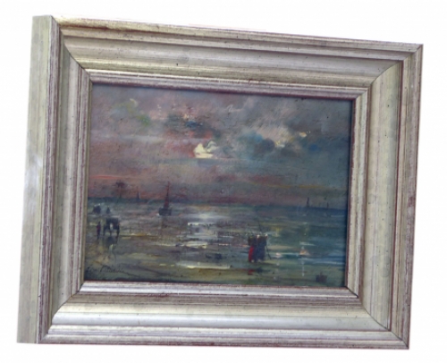 strandgezicht bij valavond met vissers