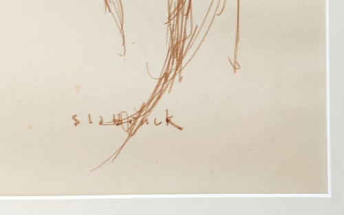 Rik Slabbinck met een tekening van een moeder met kind