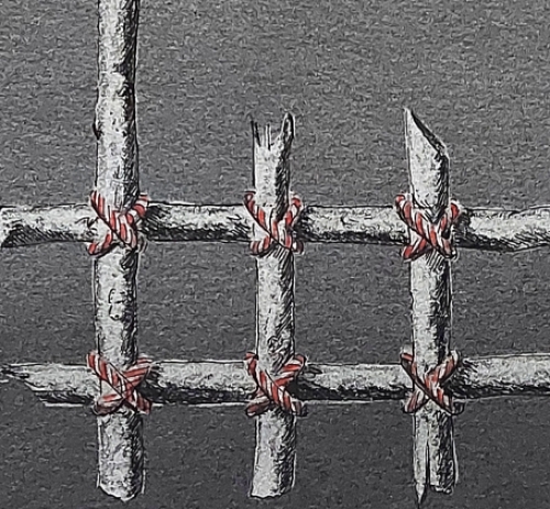 Roger Van Bulck met een potlood en pentekening