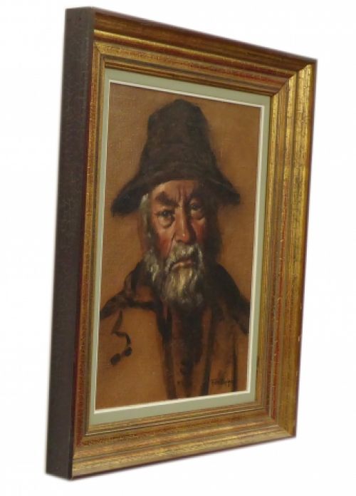 Oude man met vissershoed