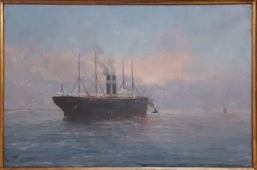 Romain Steppe met een schilderij op canvas