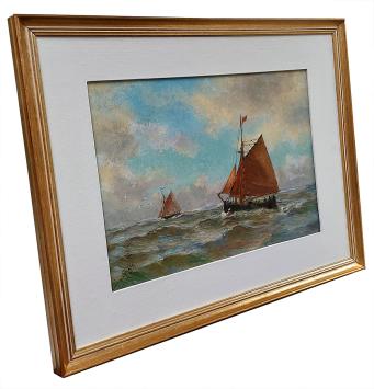 Twee zeilbootjes op de Noordzee met meeuwen