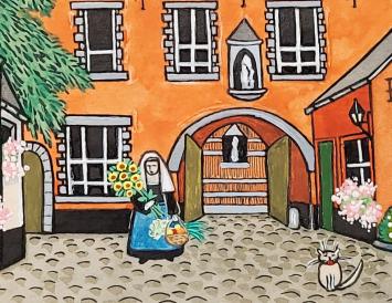 Tonet Timmermans met een klein kunstwerkje