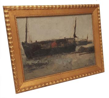 Man met boot aan de wal