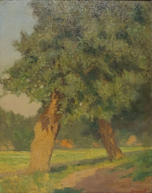 Victor Dooms met een schilderij op paneel