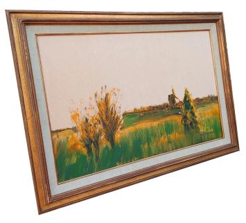 Walter Theunynck met een landschapsschilderij