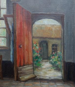 Interieuraanzicht met open deurtje naar de koer