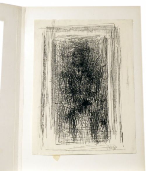 zittende man met das uit 1965